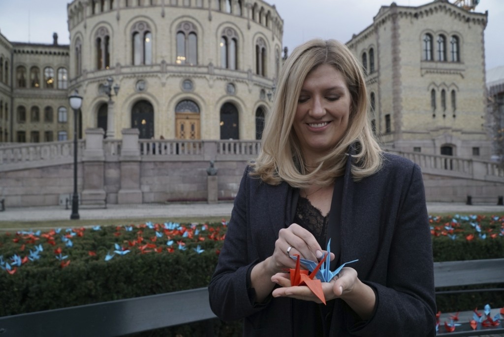 Beatrice Fihn, the executive director of the International Campaign to Abolish Nuclear Weapons (ICAN) holds two paper cranes in Oslo, Saturday, Dec. 9, 2017. ICAN, the recipient on this year’s Nobel Peace Prize, has installed 1,000 paper cranes made by children in Hiroshima, the site of the world’s first atomic bomb attack in Japan, outside the Norwegian Parliament ahead of formally receiving the prize.(AP Photo/David Keyton)